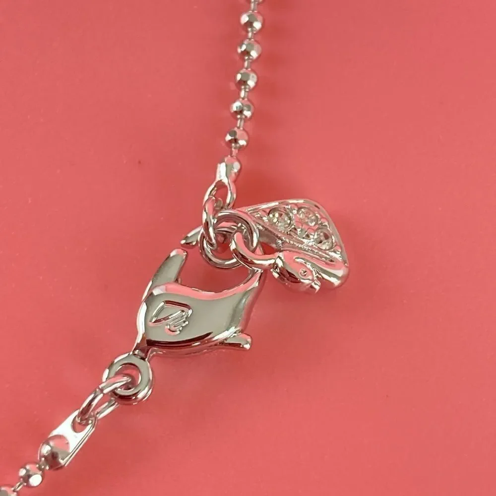 Swarovski Eliot Swing Sing Bow Tie Blue Pendant Necklace